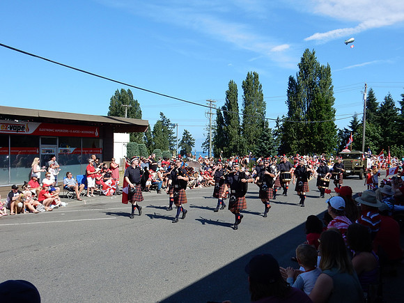 Our local pipe and drum corps came next and added the Scottish influence to the whole thing.