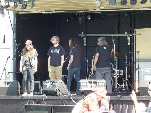 The bandstand hosted a few groups, the first was a country style blue grass group playing rock songs