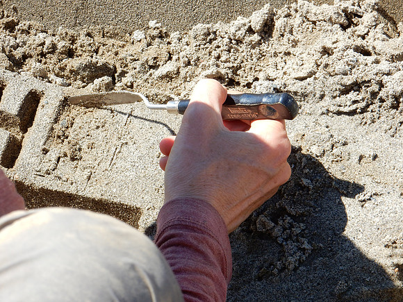 Then lifts the sand carefully and voila .. the word is formed. quite marvellous.